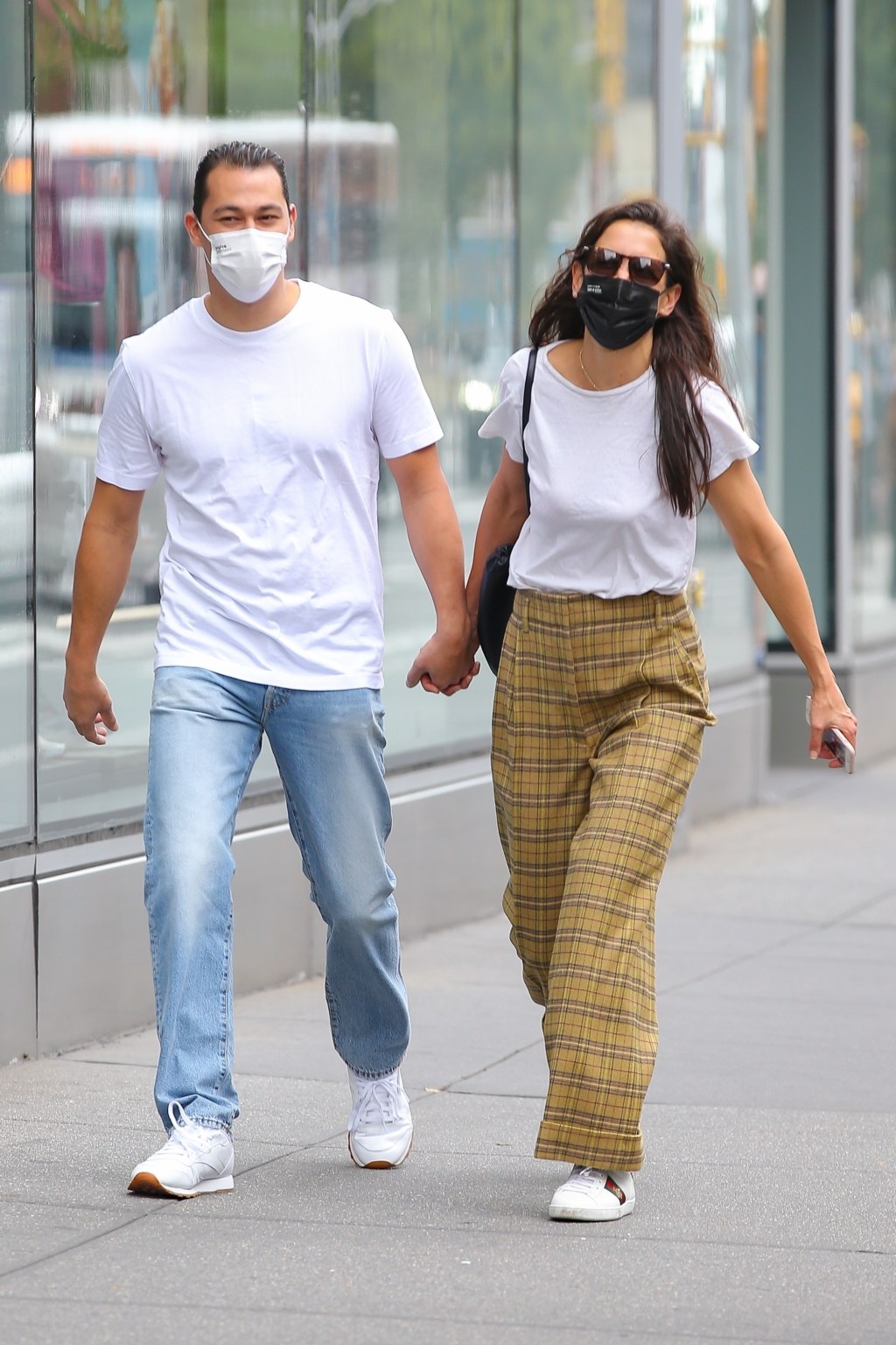 Lovebirds Katie Holmes and Emilio Vitolo Jr hold hands strolling the streets of New York